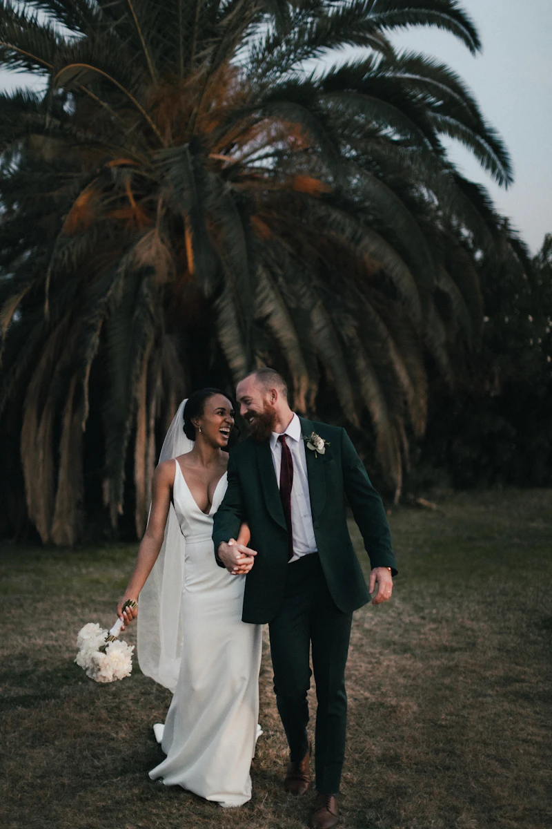 Sleek city couple portrait at dusk